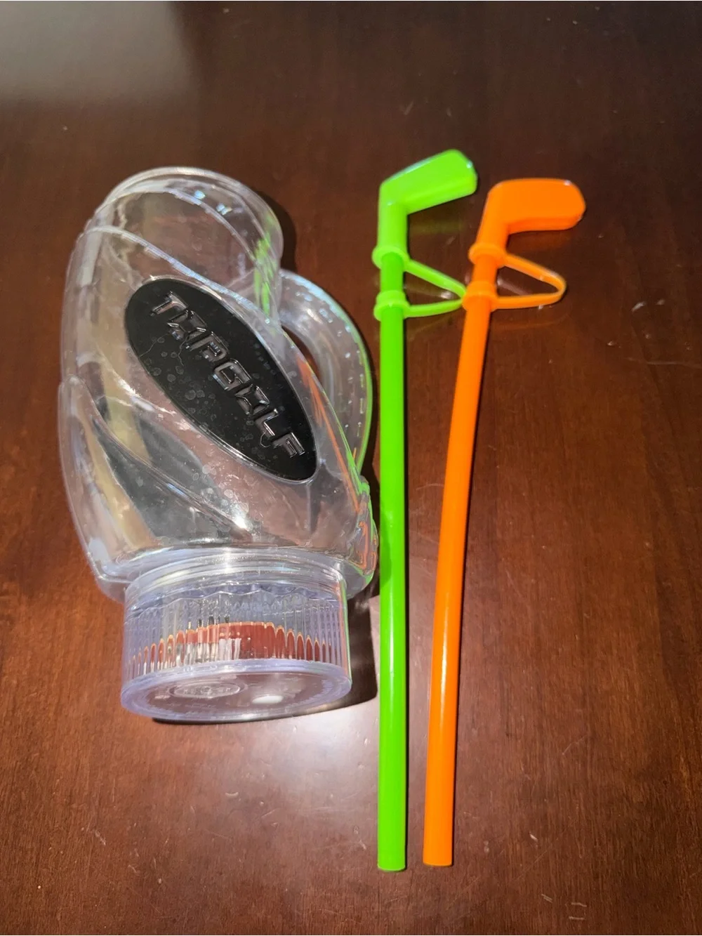Topgolf plastic drink cup with Green and Orange Drink golf club straws
